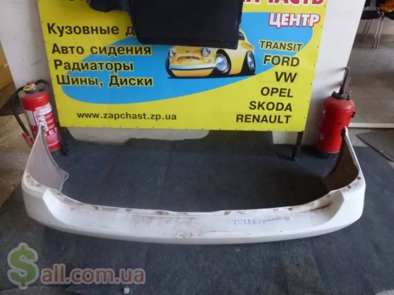 Задний бампер Opel Astra G